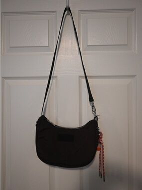 Hunter Black Crossbody Bag with Pink Accent Tassel